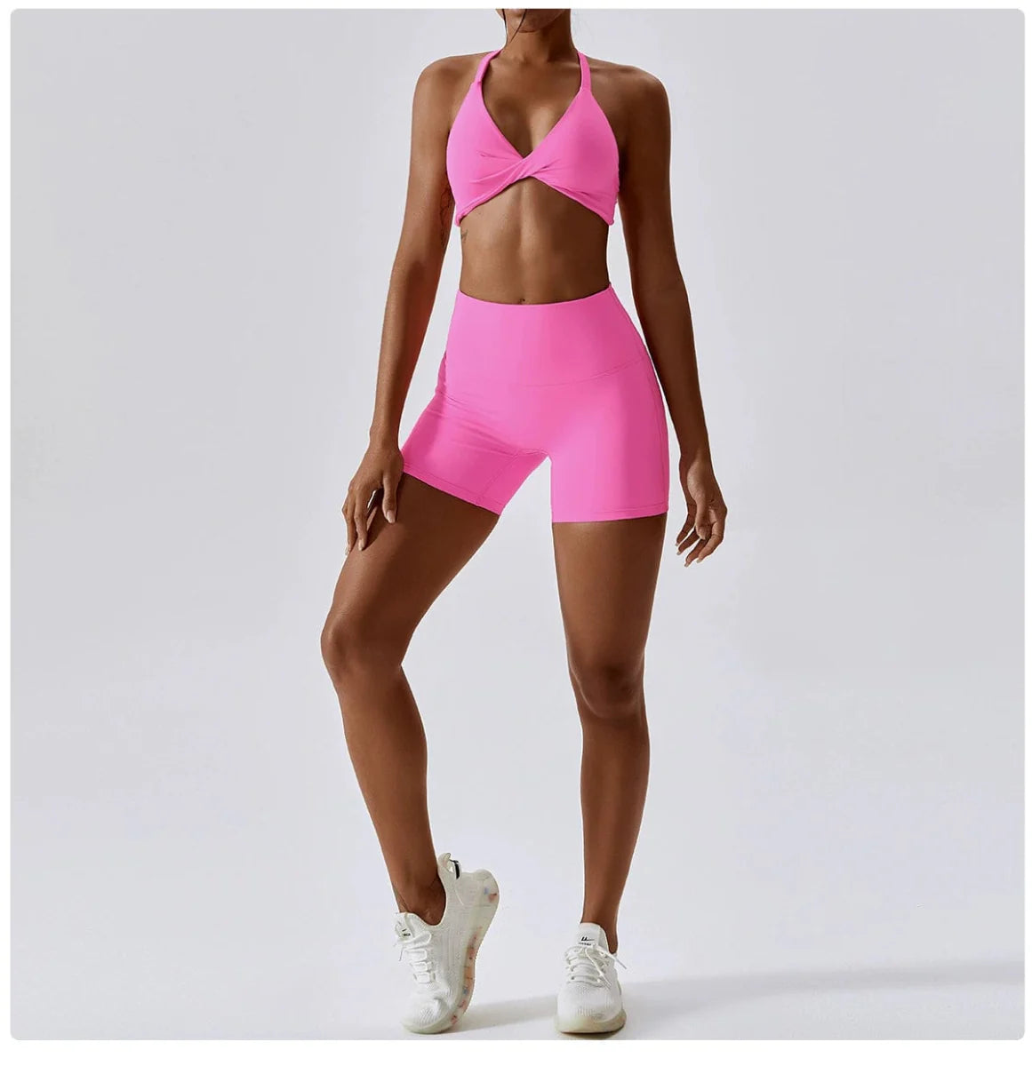 Showlu Nude Feel Yoga Suit, quick-drying two-piece fitness set with sexy back design, ideal for yoga, running, and workout sessions.