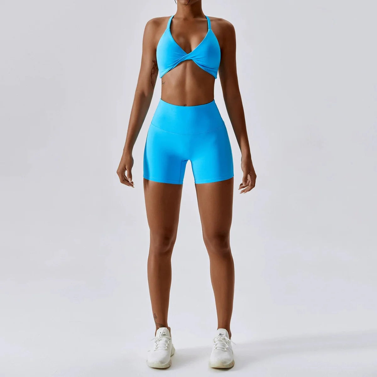 Showlu Nude Feel Yoga Suit two-piece set, quick-drying fitness clothing with a sexy back design, ideal for yoga and running.