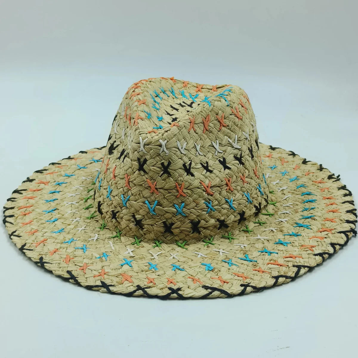 Colorful raffia straw Panama hat for women featuring bohemian stitched design, perfect for summer beach and vacation sun protection.