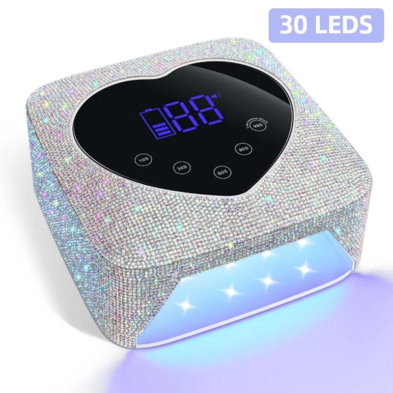 Heart-shaped Showlu 72W cordless UV LED nail lamp with rhinestones, rechargeable for quick, even gel nail curing.