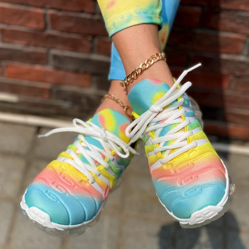 Red women's casual sports shoes by Showlu Fashion with breathable mesh design and comfortable sneaker style.