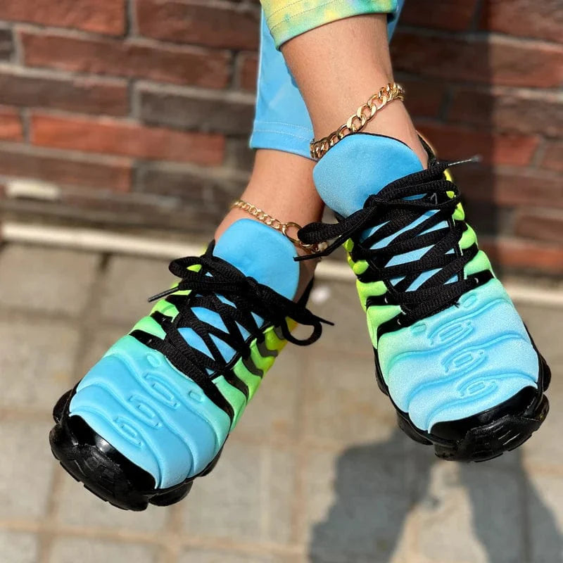 Red Showlu women's casual sports shoes with breathable mesh upper and comfortable sneaker design