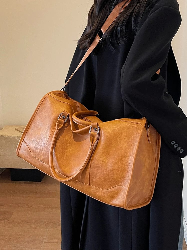 Showlu Retro PU leather travel bag for women, large crossbody luggage with textured design, ideal for business trips.