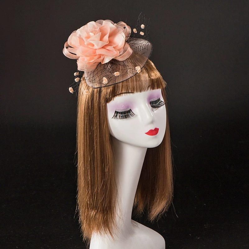 Showlu Retro Gauze Satin Hair Clip used as a photography stage ornament, featuring soft gauze and satin in a vintage style.