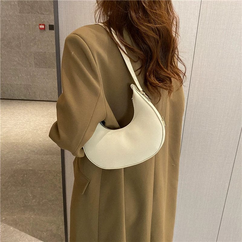 Small retro PU leather shoulder bag with underarm design, casual satchel style, perfect for everyday fashion.