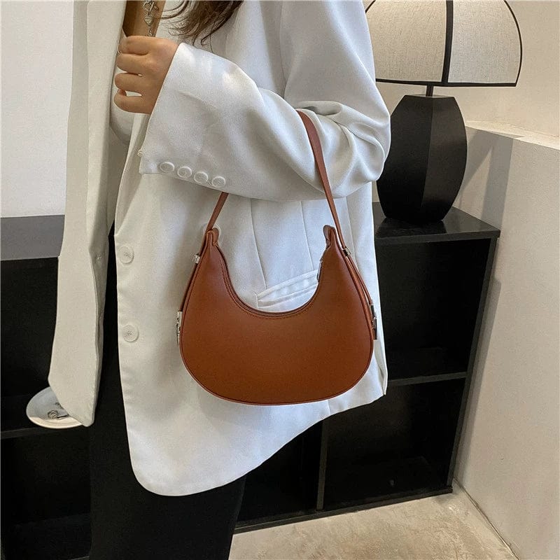 Chenxi retro PU leather underarm shoulder bag, small casual satchel with stylish design, perfect for everyday fashion.