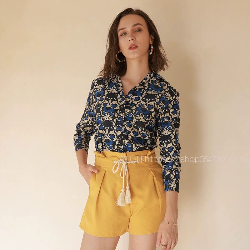 Showlu Fashion retro floral print long sleeve silk cotton polo shirt with vibrant floral pattern and classic design.