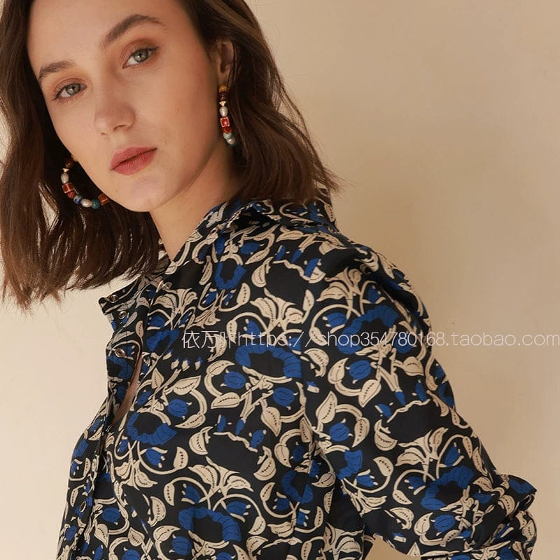 Showlu Fashion retro floral print long sleeve silk cotton polo shirt with a classic design and vibrant floral pattern.