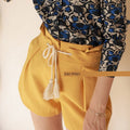 Showlu Fashion retro floral print long sleeve silk cotton polo shirt with vibrant floral patterns and classic fit.