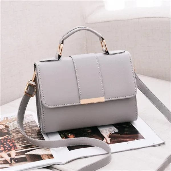 Showlu Fashion women's PU leather flap shoulder bag with retro crossbody design and high-quality construction.