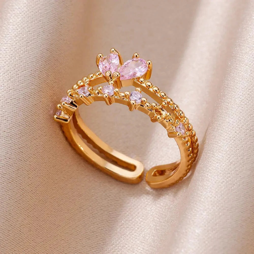 Showlu Women's vintage angel feather ring in gold stainless steel, featuring intricate feather design and elegant jewelry style.