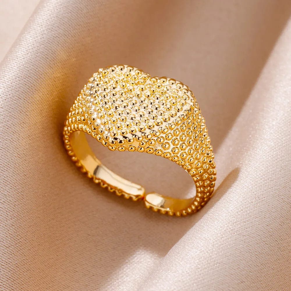 Showlu Women's vintage gold stainless steel angel feather ring with intricate feather design, perfect for elegant finger jewelry.