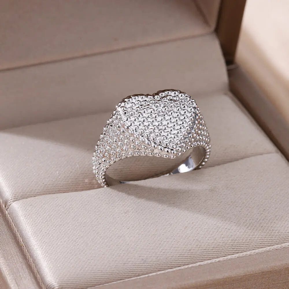 Showlu Women's vintage gold stainless steel angel feather ring, elegant jewelry accessory for women with detailed feather design.
