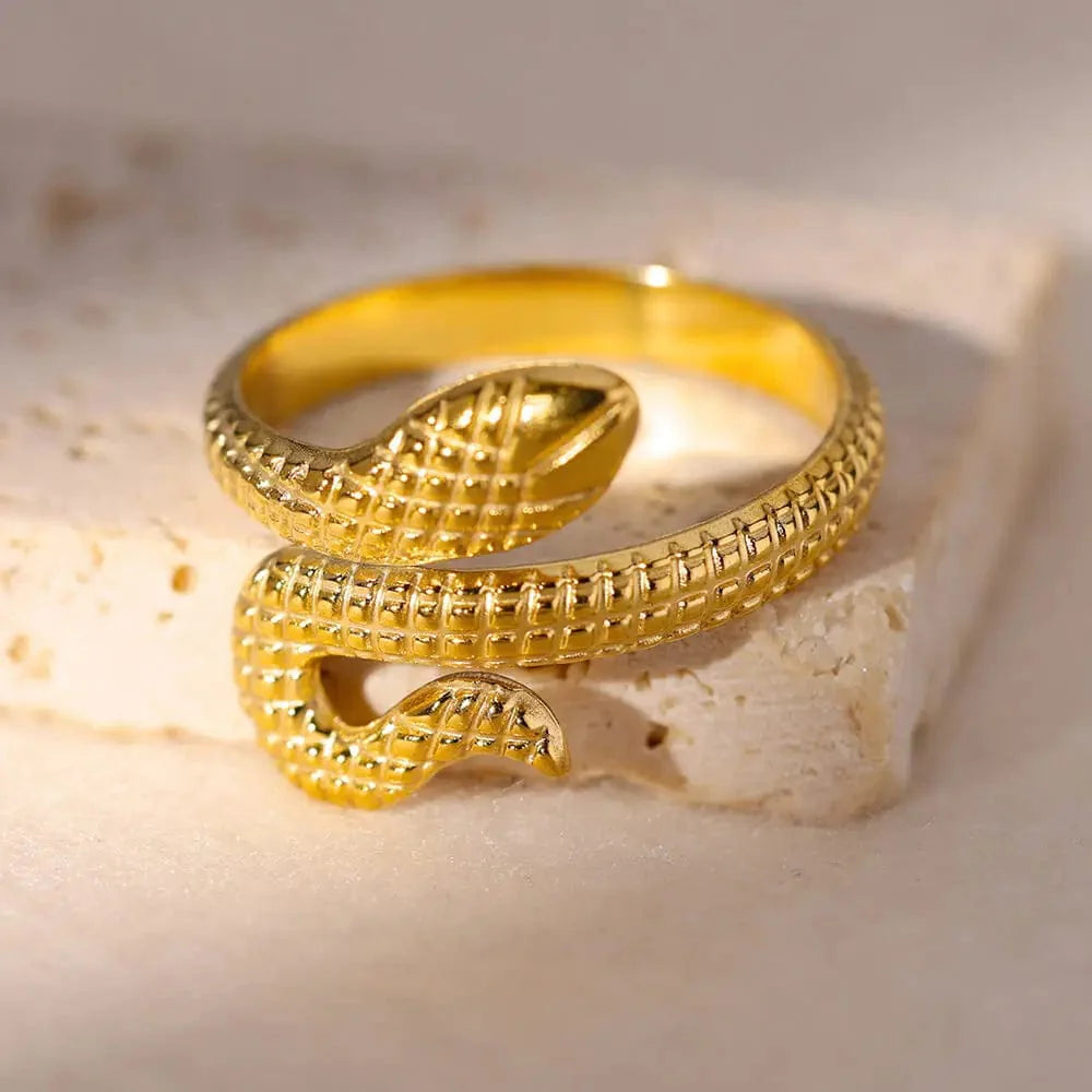 Showlu Women's vintage gold stainless steel angel feather ring, delicate jewelry accessory for women, finger ring with angel design.