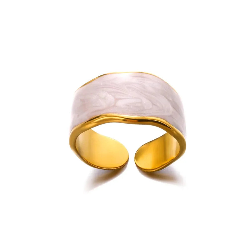 Showlu Women's Vintage Angel Feather Ring in gold stainless steel, featuring a delicate feather design on a stylish band.