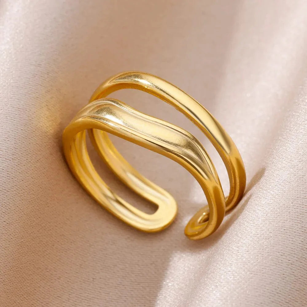 Showlu Women's vintage gold stainless steel angel feather ring with intricate feather design on a slim band.