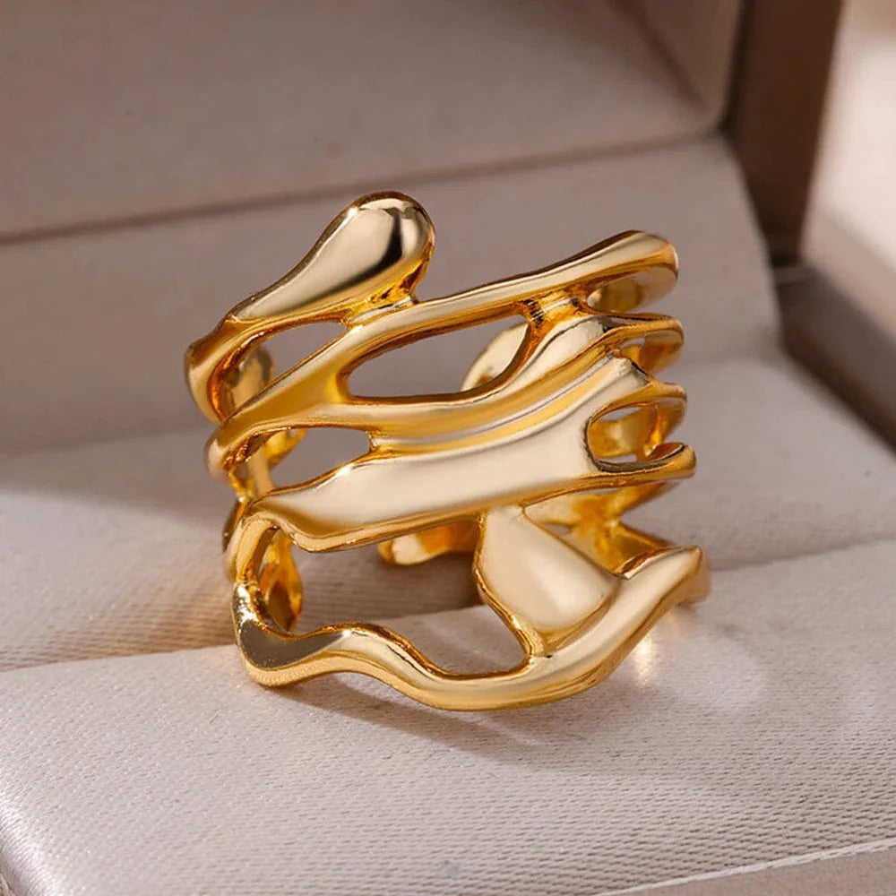 Showlu Women's vintage gold stainless steel angel feather ring with intricate feather design, elegant jewelry for women.