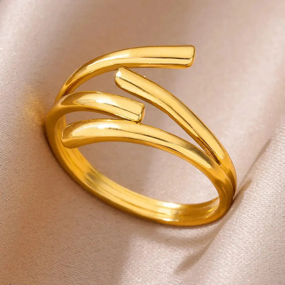 Showlu Women's vintage gold stainless steel angel feather ring with intricate feather design and elegant band for women.