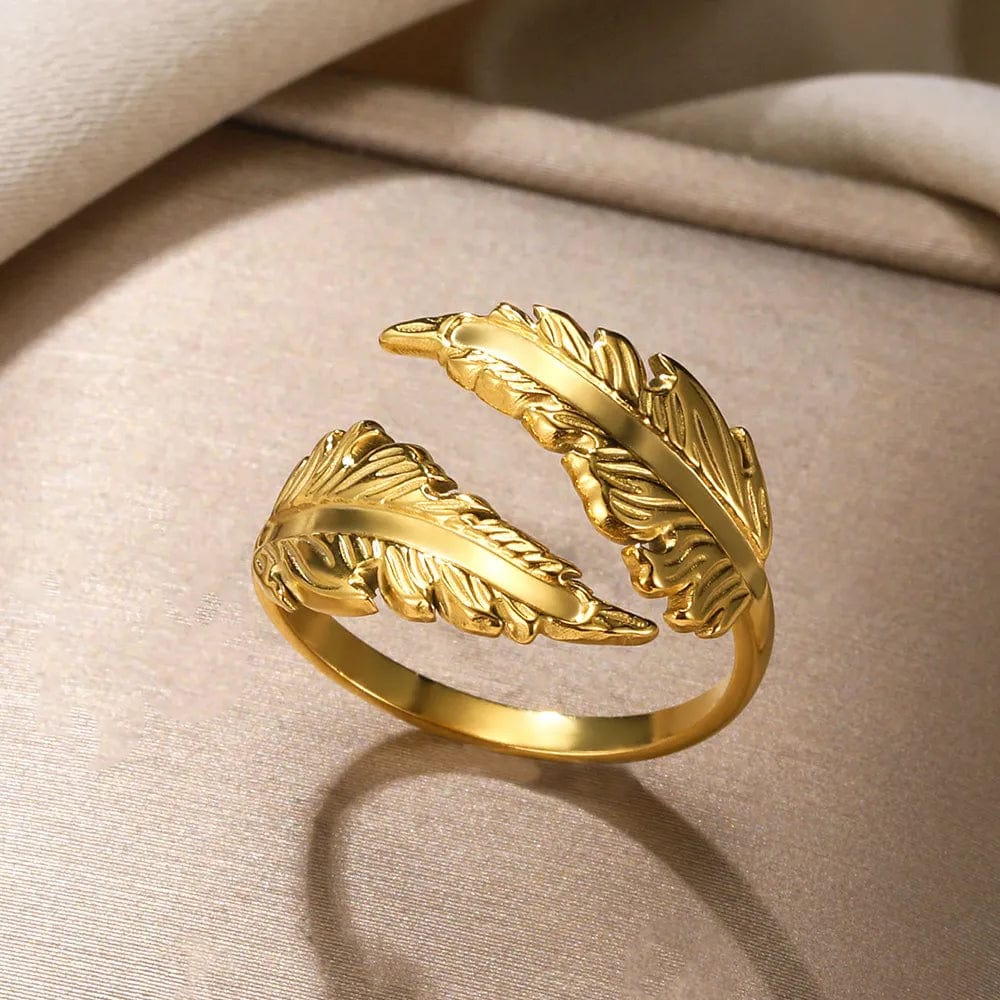 Showlu Women's Vintage Angel Feather Ring in gold stainless steel, featuring a delicate feather design for stylish finger jewelry.