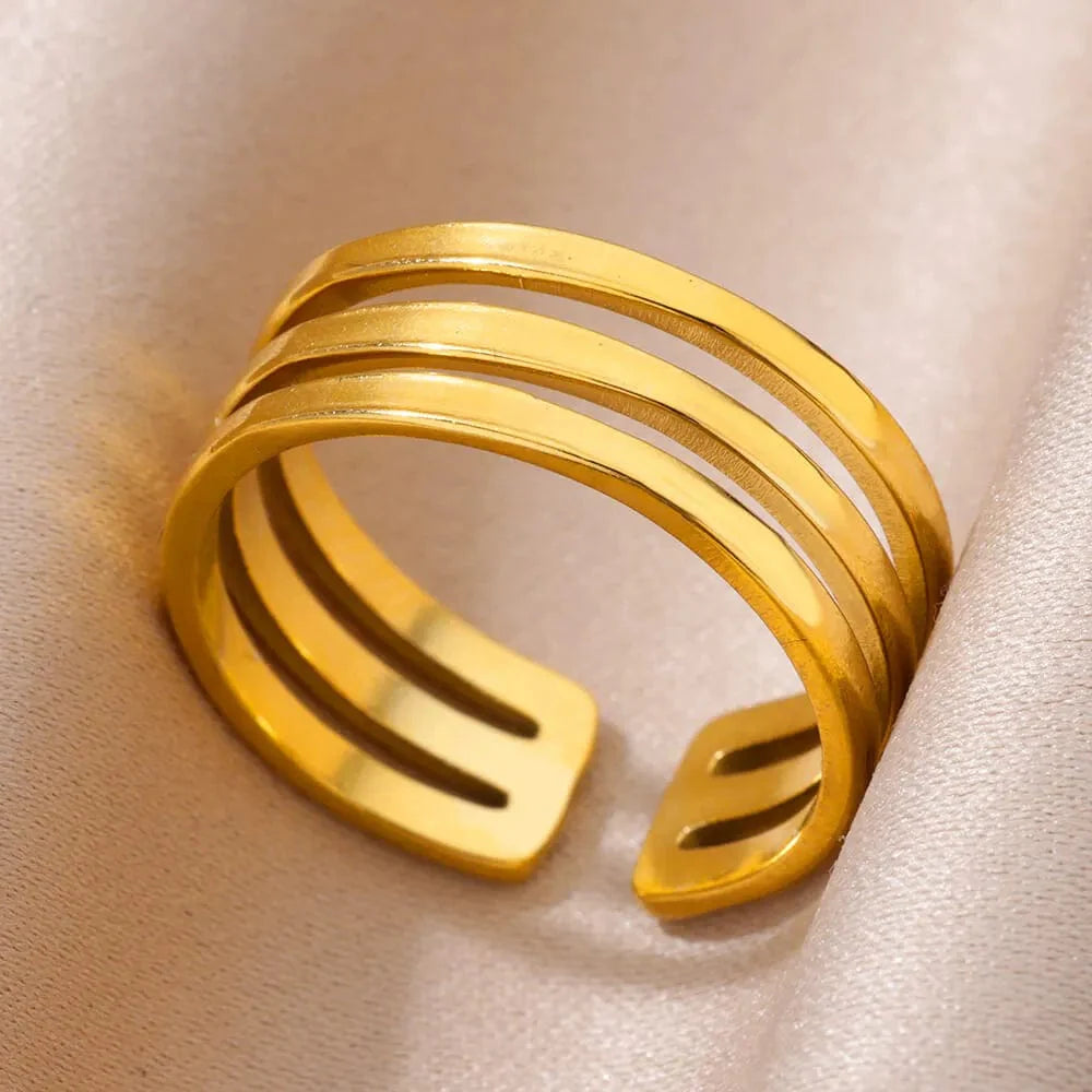 Showlu Women's vintage gold stainless steel angel feather ring with intricate feather design, stylish jewelry for women.