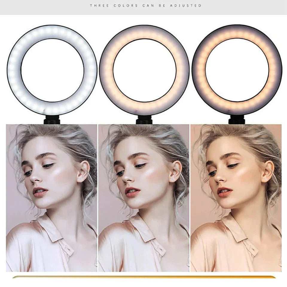 Showlu Fashion 10-inch LED ring light mounted on tripod stand for phone photography, providing even, bright lighting for selfies and videos.