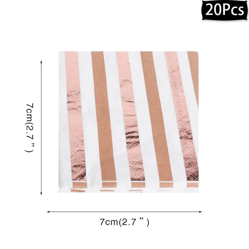 Rose gold disposable tableware set with paper plates, cups, napkins, and tablecloth for birthday parties and weddings.