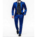 Royal blue satin men's 2-piece slim fit suit by Showlu Fashion, featuring a shawl lapel tuxedo with blazer and pants for formal occasions.
