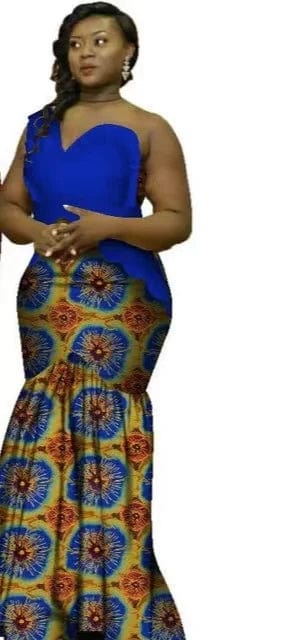 Pair of GuyaWax African Dashiki tops and matching Bazin Riche wedding dresses for men and women, stylish traditional African attire.