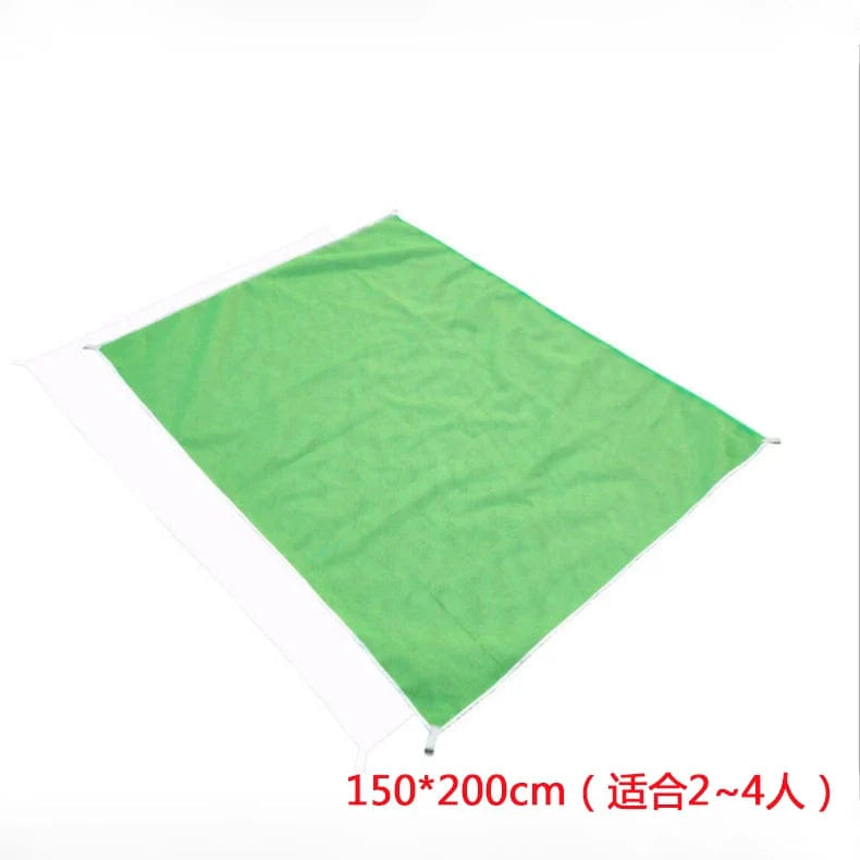 Oversized Cool Far City Sand Free Beach Mat by Showlu Fashion Store, showing the outdoor magic leakage pad on sandy beach.