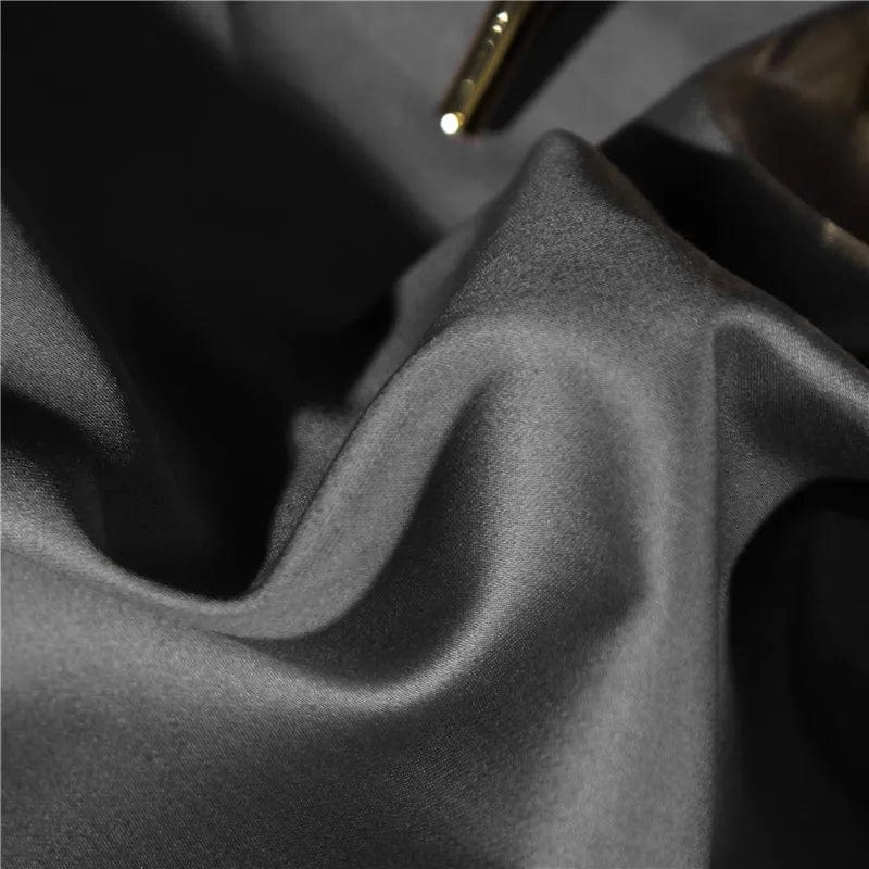 Luxury Gradient 1200TC Egyptian cotton bedding set with gold embroidery, satin duvet cover, pillowcases, and fitted sheet in queen and king sizes.