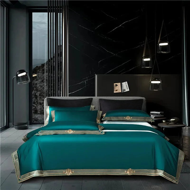 Luxury satin Egyptian cotton bedding set with gold embroidery, includes duvet cover, flat and fitted sheets, and pillowcases.