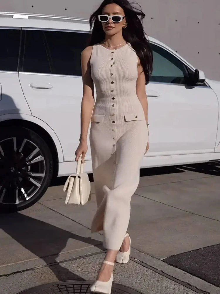 Apricot sleeveless maxi dress for women with high slit, round neck, and elegant design, perfect for summer parties or beachwear.