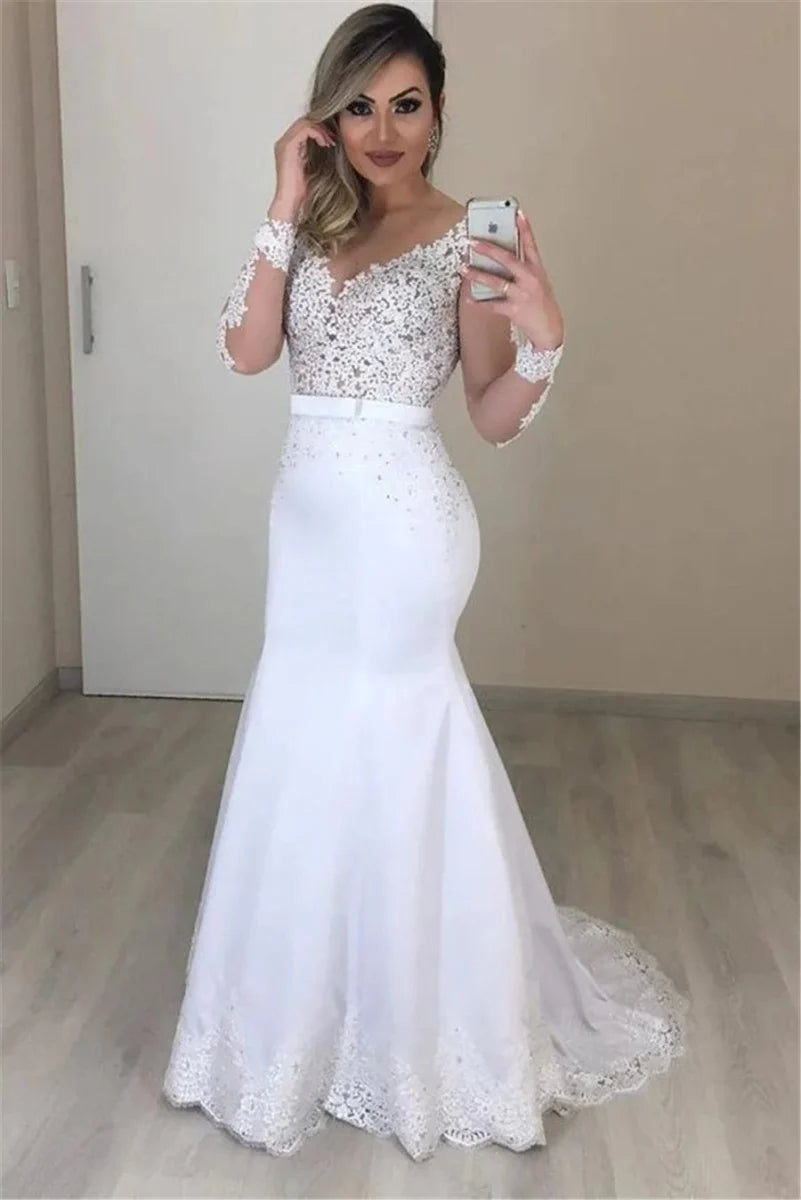 Sheer long sleeve mermaid wedding dress with see-through back and detachable train, elegant bridal gown by SHOWLU FASHION STORE.