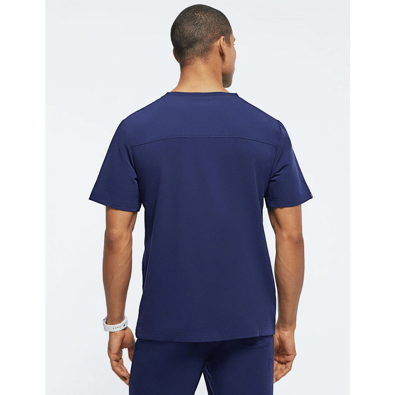 Unisex medical scrub set with short sleeves, stretchy jogger style, designed for men and women, in a professional beauty salon or healthcare setting.