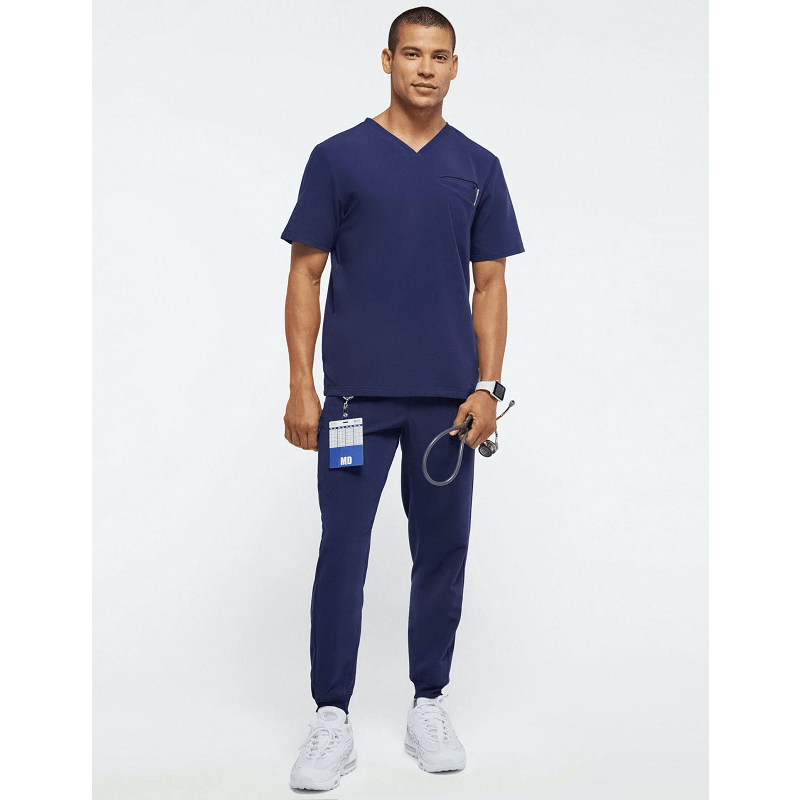 Unisex medical scrub set with short sleeves, stretchy jogger style, suitable for men and women, in a clean, professional salon or hospital setting.
