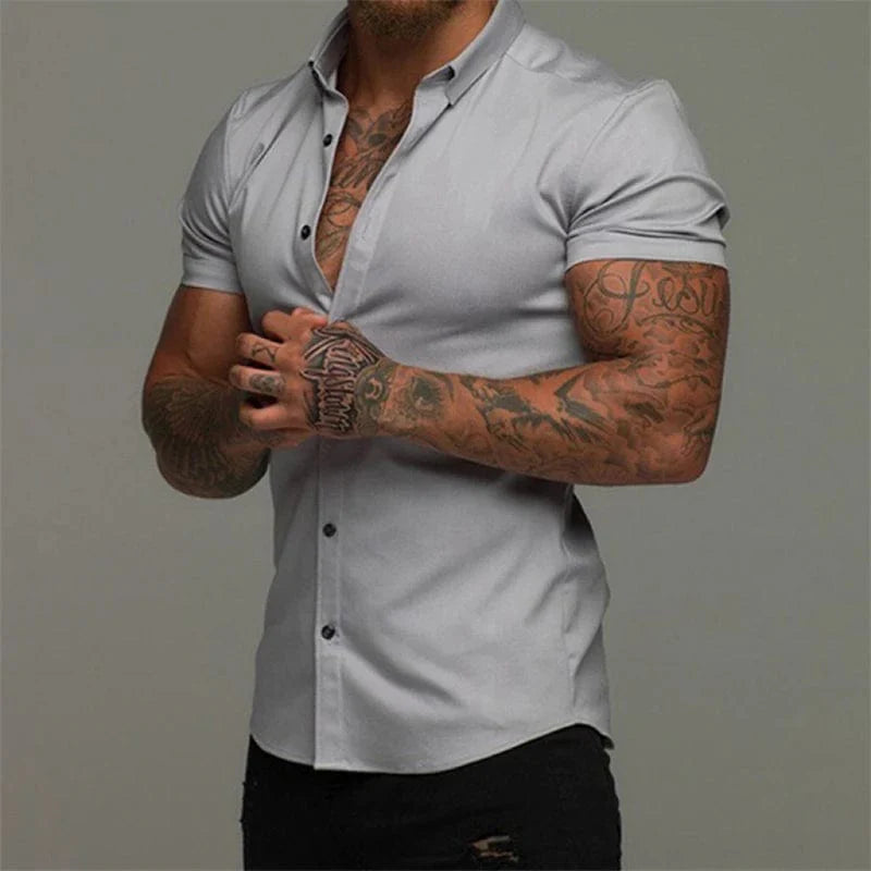 Showlu men's short sleeve silk dress shirt with no-iron, solid color, lapel, and casual style, available in oversized sizes.