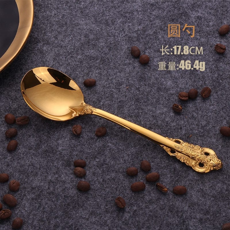 Nordic Relief Golden stainless steel tableware set with knife, fork, and spoon for Western dining, featuring a sleek, modern design.