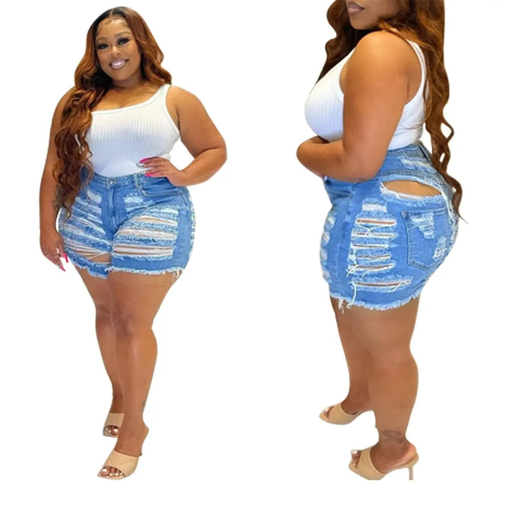 Plus size ripped denim shorts for women by Showlu Fashion, elastic waist, solid color, casual sexy jean shorts for summer.