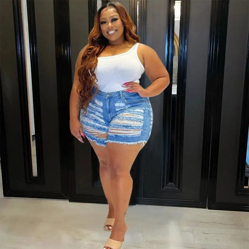 Showlu Women's plus size ripped denim shorts with elastic waistband, casual and stylish, solid color, fashionable plus size jeans shorts