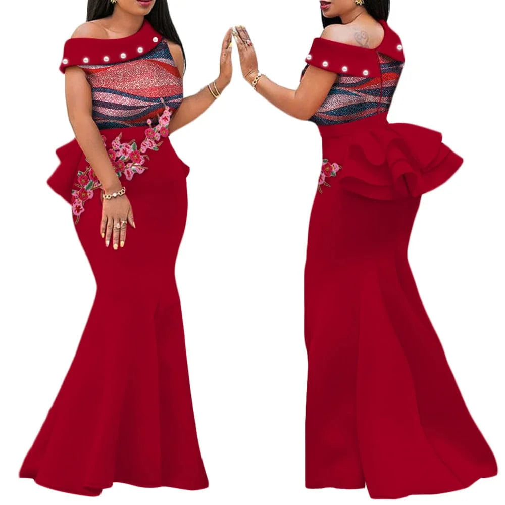 African print long dress by SHOWLU FASHION STORE featuring cotton applique, draped design, and traditional vibrant patterns for women.