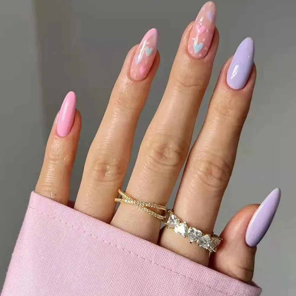 Showlu Purple Floral Almond Press-On Nails with floral design, 24-piece set of detachable acrylic tips for easy manicure.