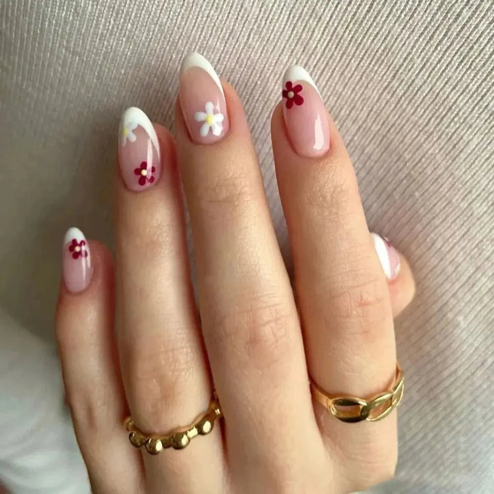 Showlu Purple Floral Almond Press-On Nails set with 24 detachable acrylic tips featuring floral design for easy manicure at home.