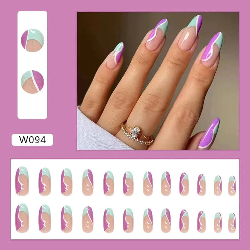 Purple floral almond press-on nails by Showlu Fashion Store, 24-piece set with detachable acrylic tips for manicures.