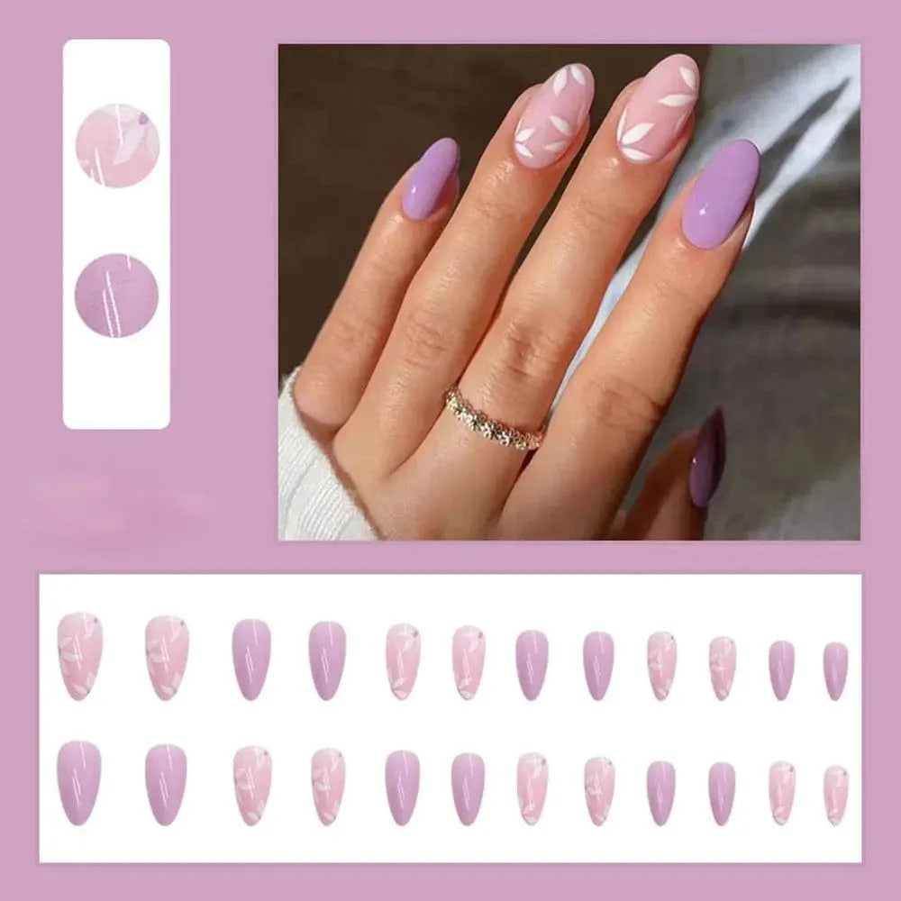 Showlu Purple Floral Almond Press-On Nails, 24-piece set of detachable acrylic tips with floral design for stylish manicures.