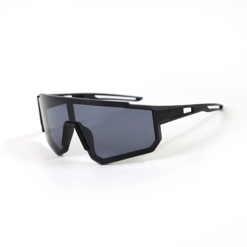 Showlu Fashion Kids UV400 sports sunglasses in black and grey with colorful lenses, designed for boys and girls outdoor cycling.