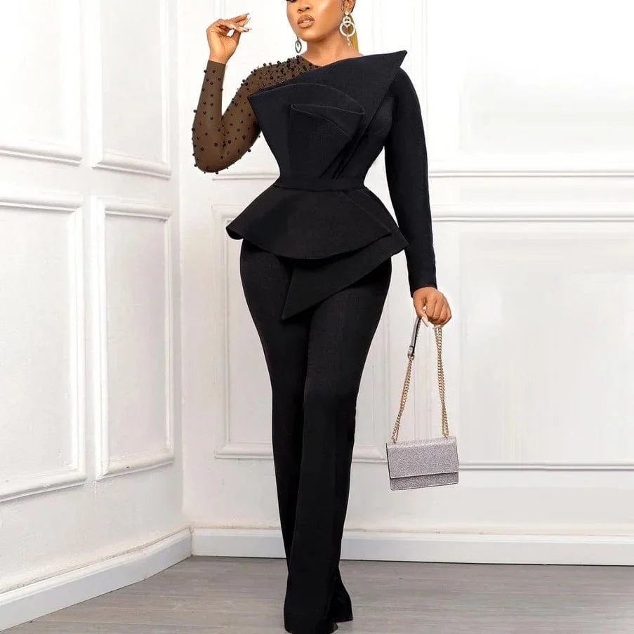 Elegant black women's beaded high-waisted party jumpsuit with transparent sleeves and round neckline, stylish and luxurious.