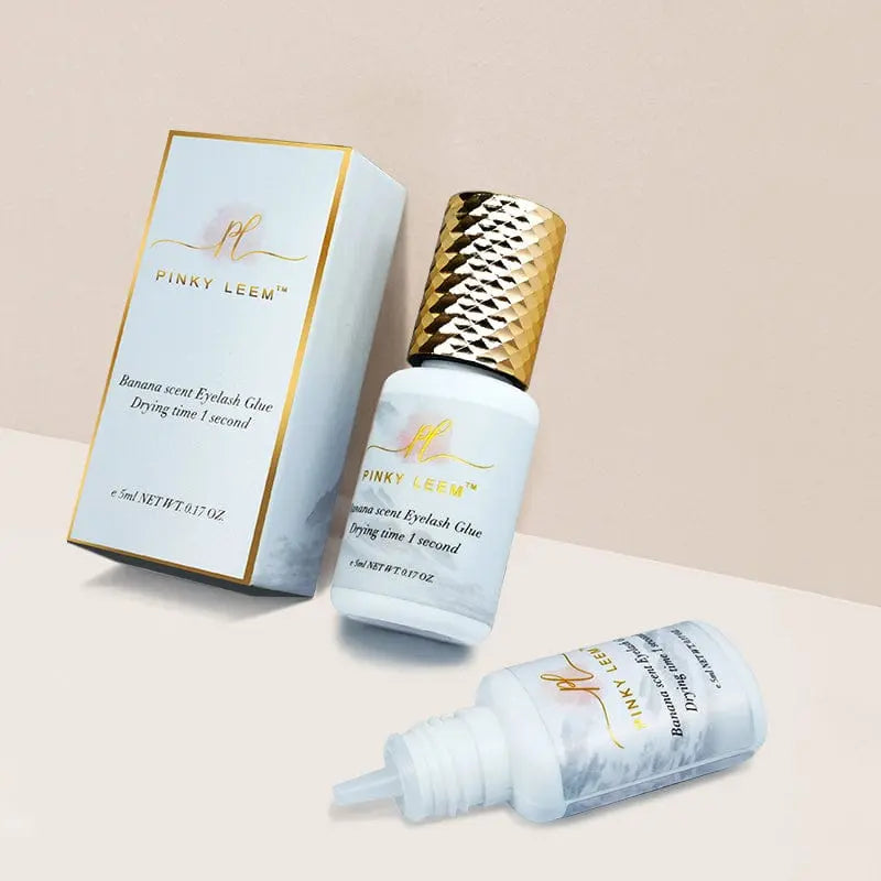 Pink Leem Banana Scent Eyelash Extension Glue by Showlu Fashion Store, latex-free Korean eyelash adhesive in black bottle.