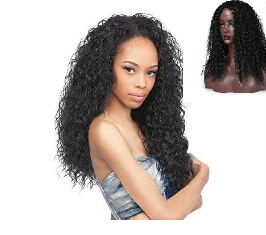 A woman wears a long, black, curly wig with voluminous, tight ringlet curls.