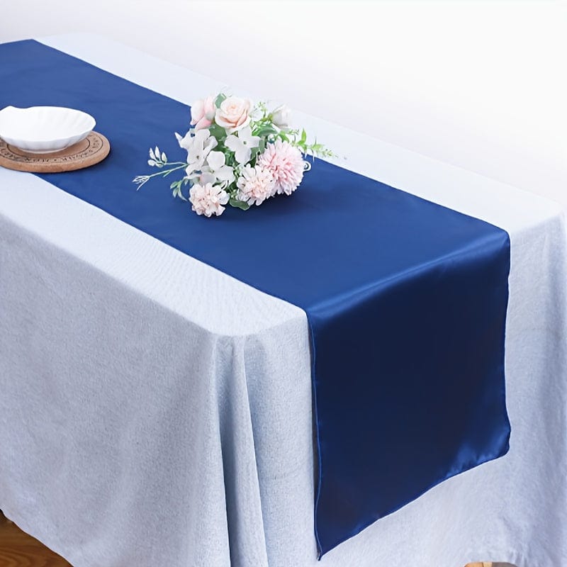 Elegant blue satin table runner by Showlu Fashion, 12x108 inches, smooth polyester fabric ideal for wedding and party decor.