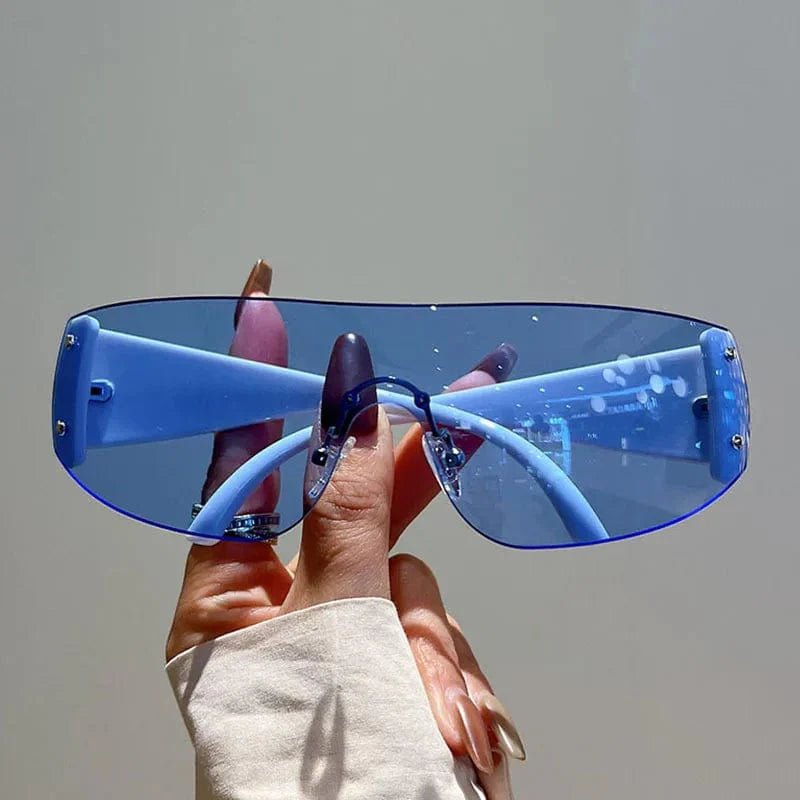 Buyuteen Y2K rimless sunglasses by Showlu Fashion, pink steampunk UV400 shades with rivet details, luxury unisex designer eyewear.